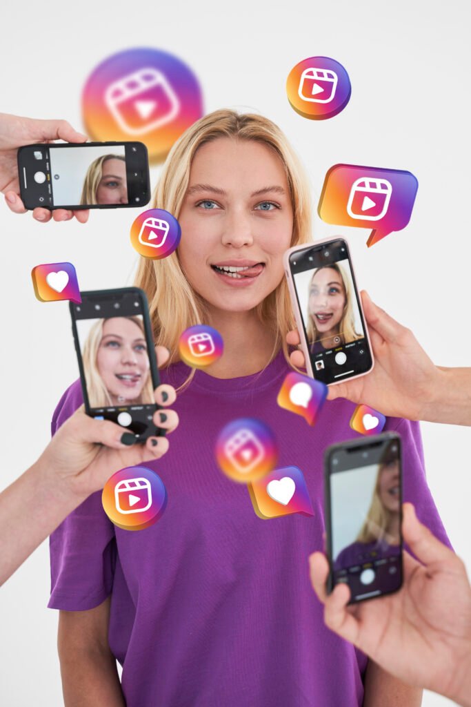 WOMWN STANDING POTO OF THAT WOMEN ARE TAKEN PLACE WITH SEVERAL PHONE FORM DIFFERENT SIDES LOGO OF REELS ALSO PROJECTING ADS INSTGRAM ADS